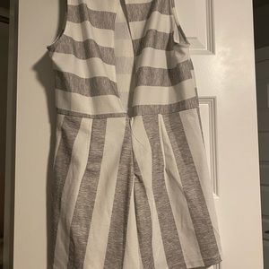 gray and white romper. small